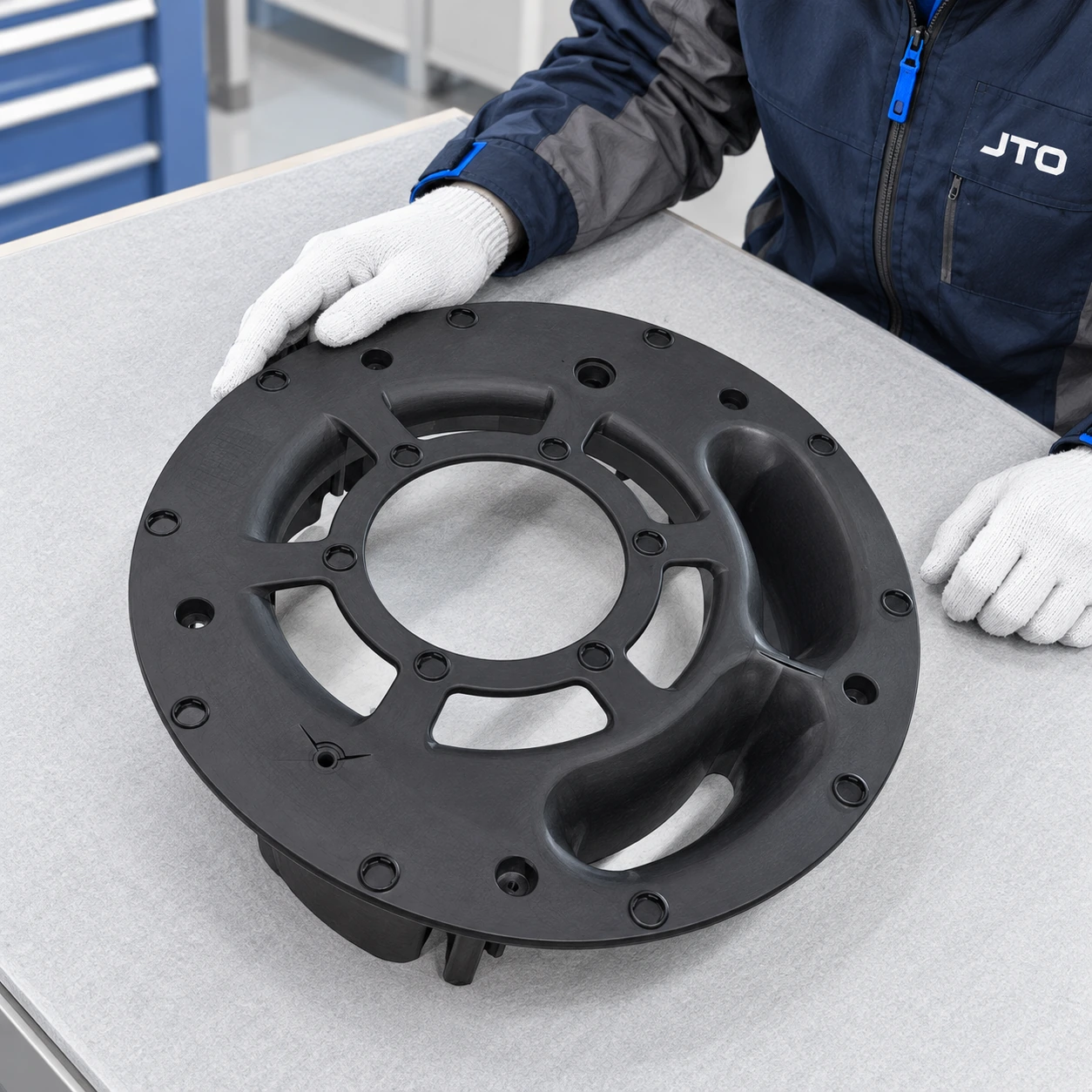Illustrative component beside a digital tooling view.